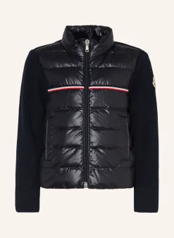 Daunenjacke im Materialmix