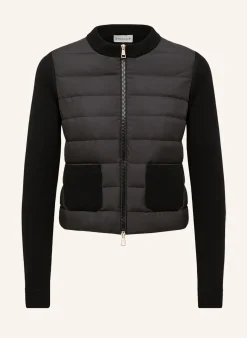 Daunenjacke im Materialmix