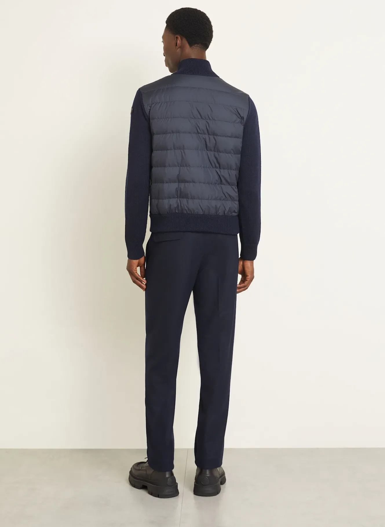 Daunenjacke im Materialmix