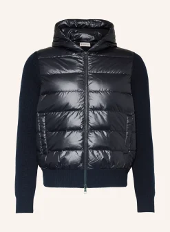 Daunenjacke im Materialmix