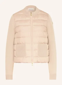 Daunenjacke im Materialmix