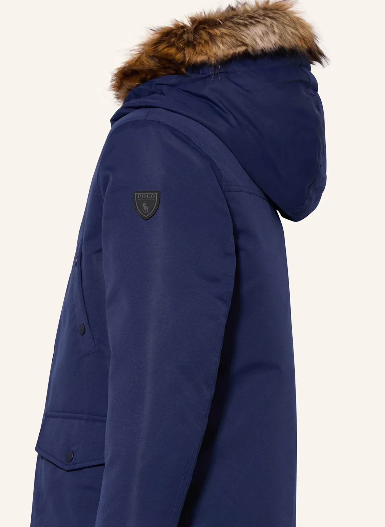 Daunenjacke mit Kunstpelz
