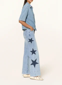 Flared Jeans mit Schmuckperlen