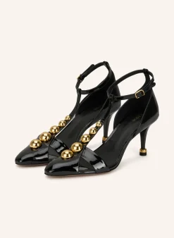 Lack-Pumps mit Nieten