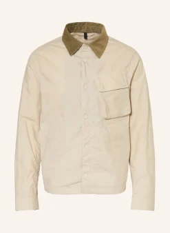 Overjacket im Materialmix