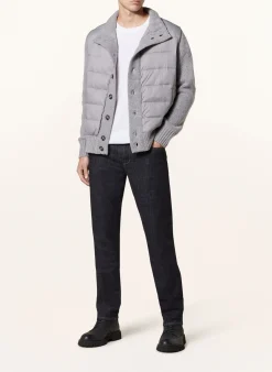 Strickjacke im Materialmix
