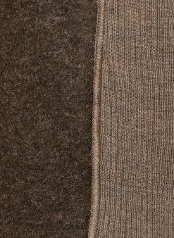 Strickweste im Materialmix